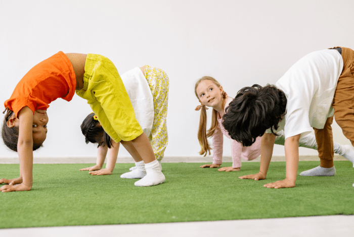 Children doing gymnastics crawling