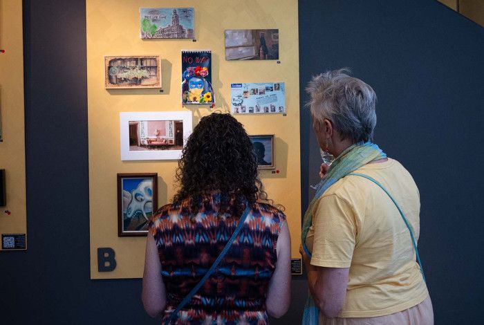 People looking at an exhibition