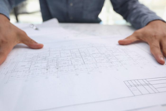 Person reviewing development plans