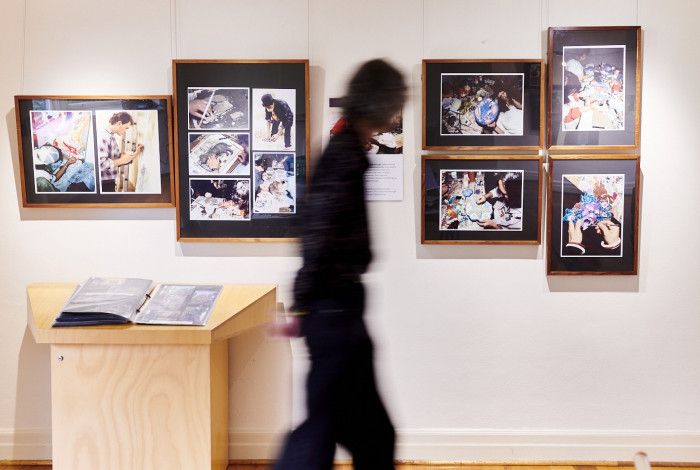 Person walking past display.
