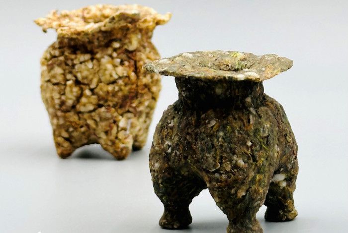 Two abstract forms made of rice clay.