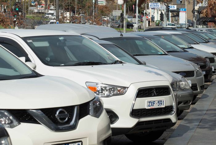 Cars parked in a parking bay