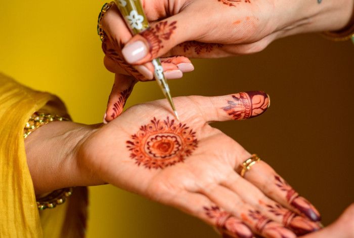 Someone got their hand painted with henna.