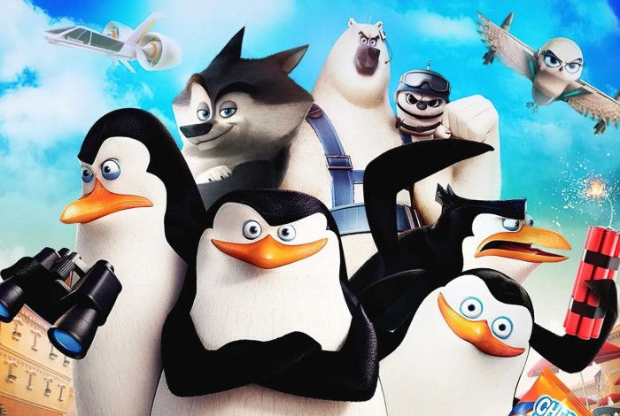 5 penguins with an airplane as a background