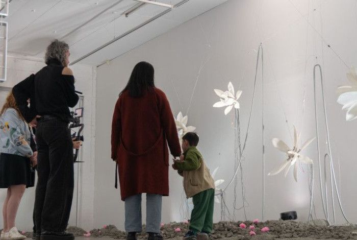People looking at an exhibition