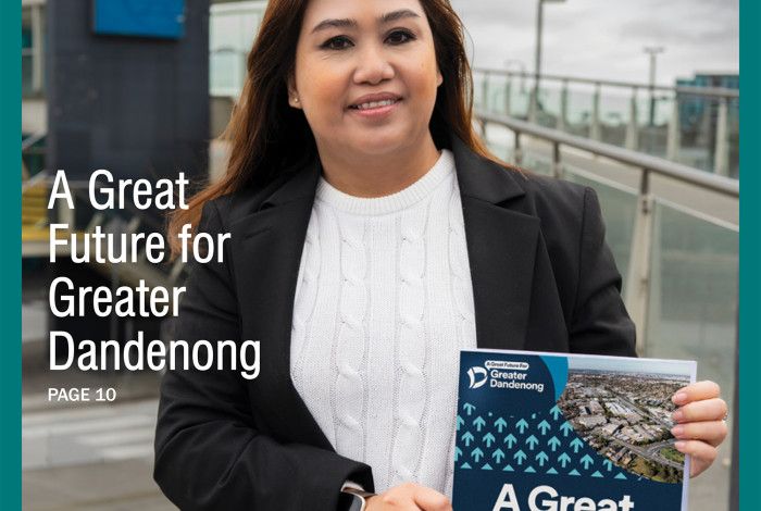 Greater Dandenong Council News September 2026 the Mayor holding a booklet