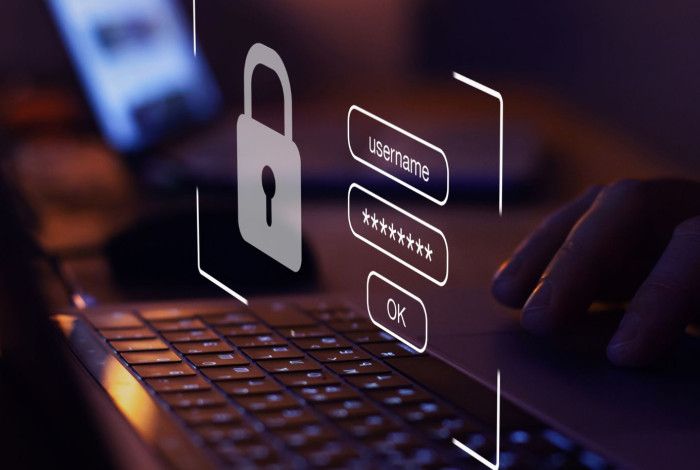 A close-up of a laptop displaying a secure login screen with a padlock icon, symbolising online security, privacy and password protection.
