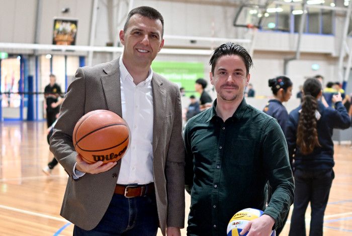 Cr Bob Milovich with another staff member at the basketball stadium