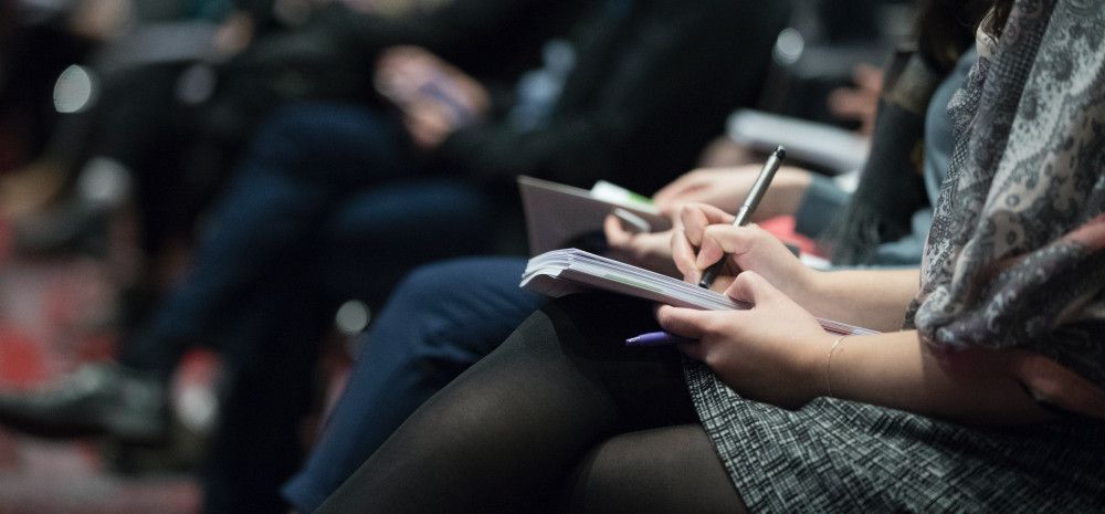 people sitting in a meeting