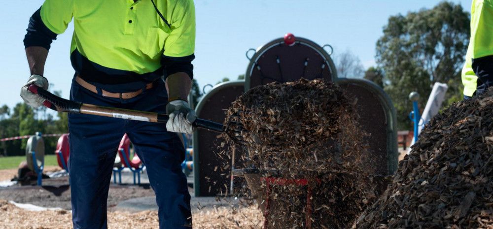 worker using a shovel