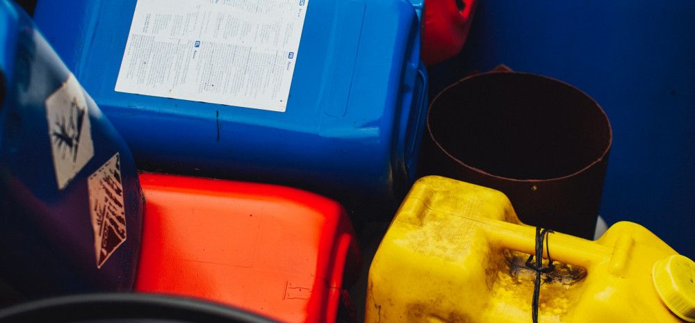 assorted liquid waste bottles