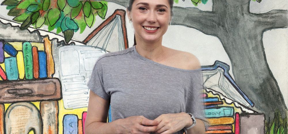 Illistrator Laura Habarow smiling at camera.