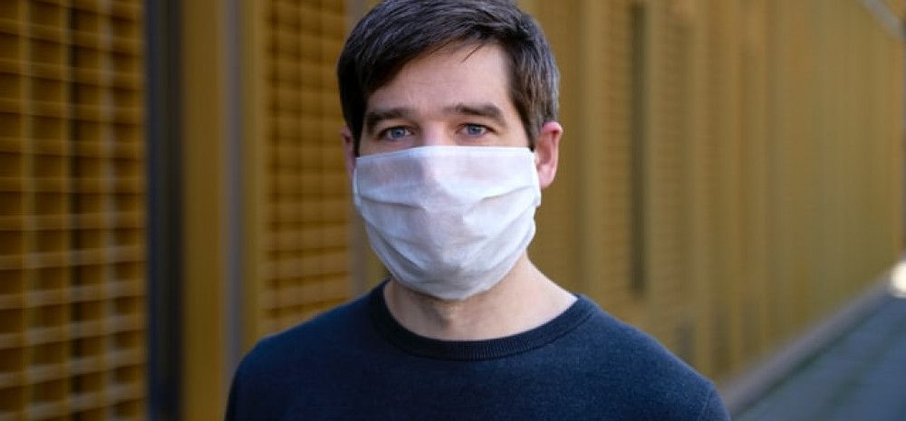 Young man in face mask