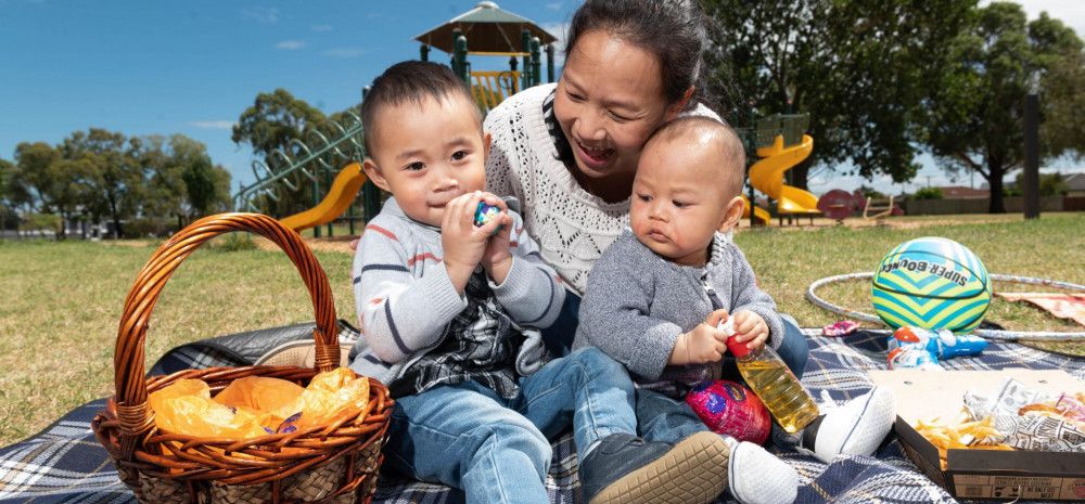 Mother and children in park