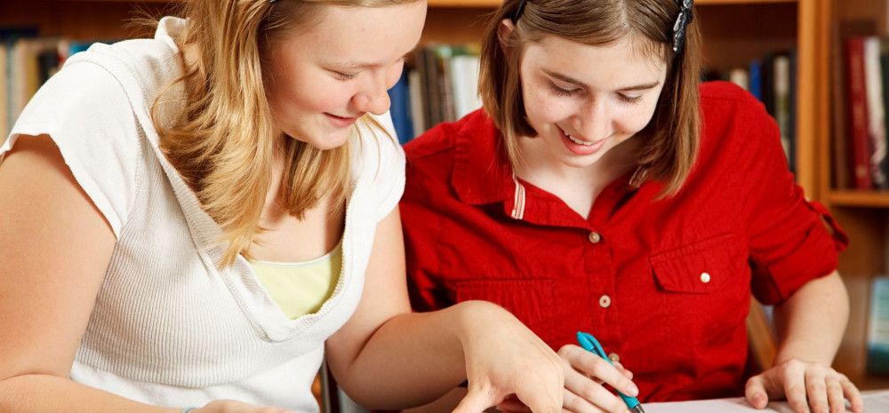two girls studying together