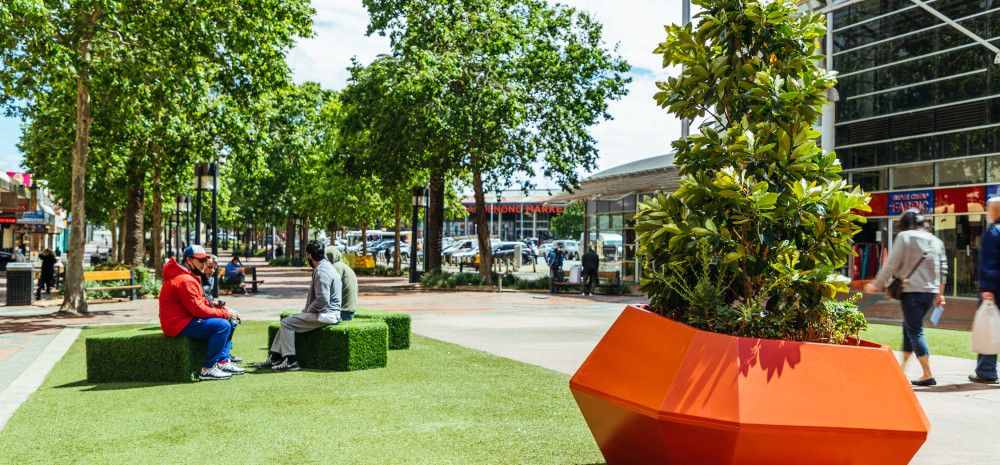 People sitting on a bench outdoors