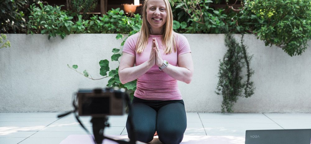 Lady sitting on a mat