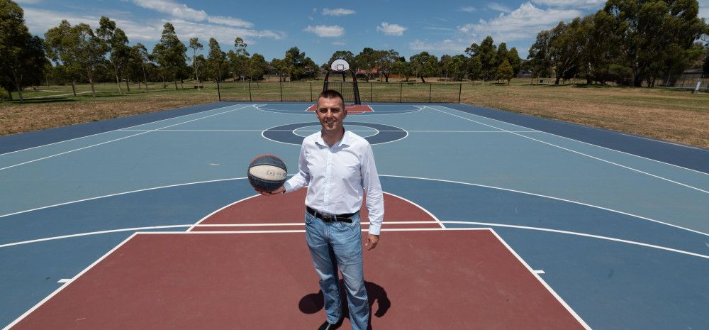 Councillor Bob Milkovic at the Tirhatuan Park basketball court