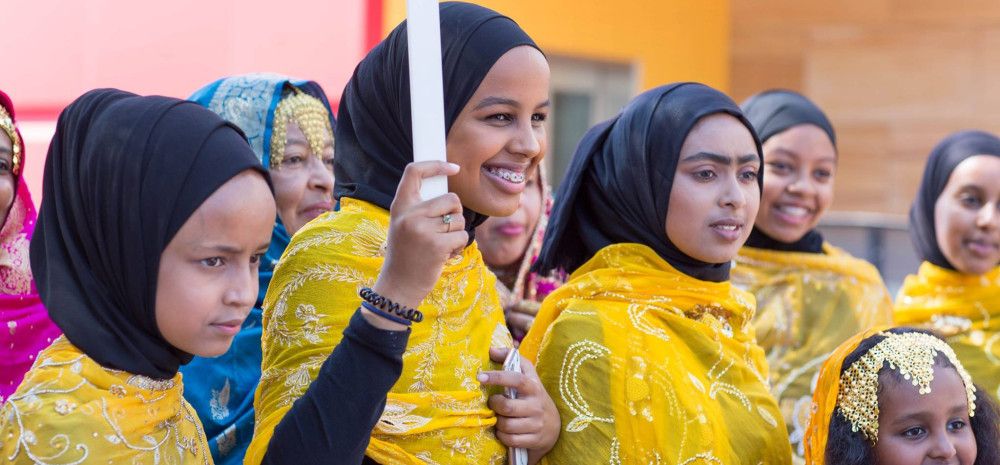 A group of young women in traditional dress