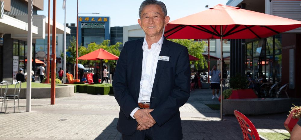 Councillor Richard Lim standing in Multicultural Place Springvale