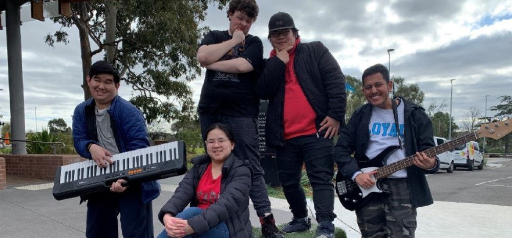 a group of young people outside