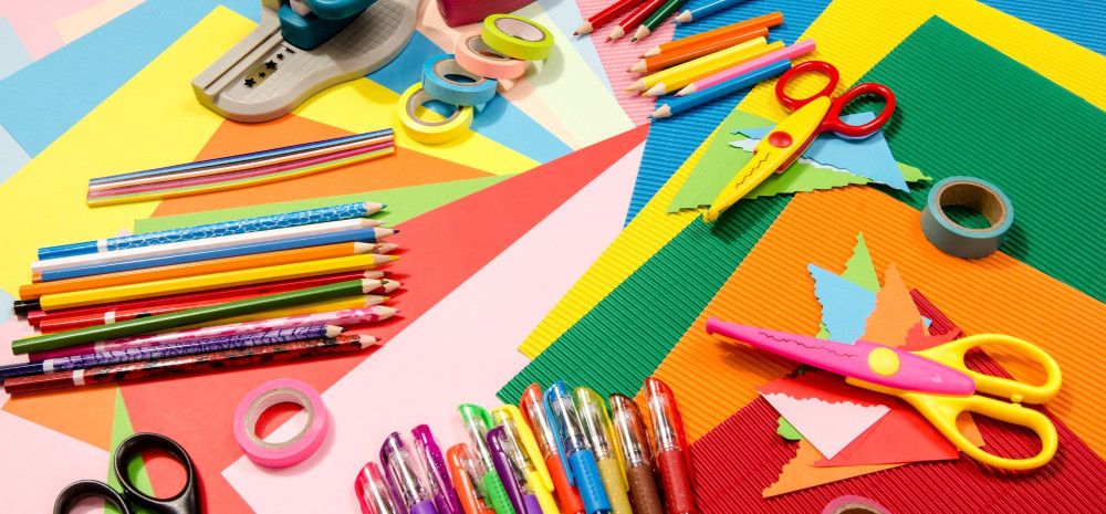 Craft activities coloured paper, pencils and scissors