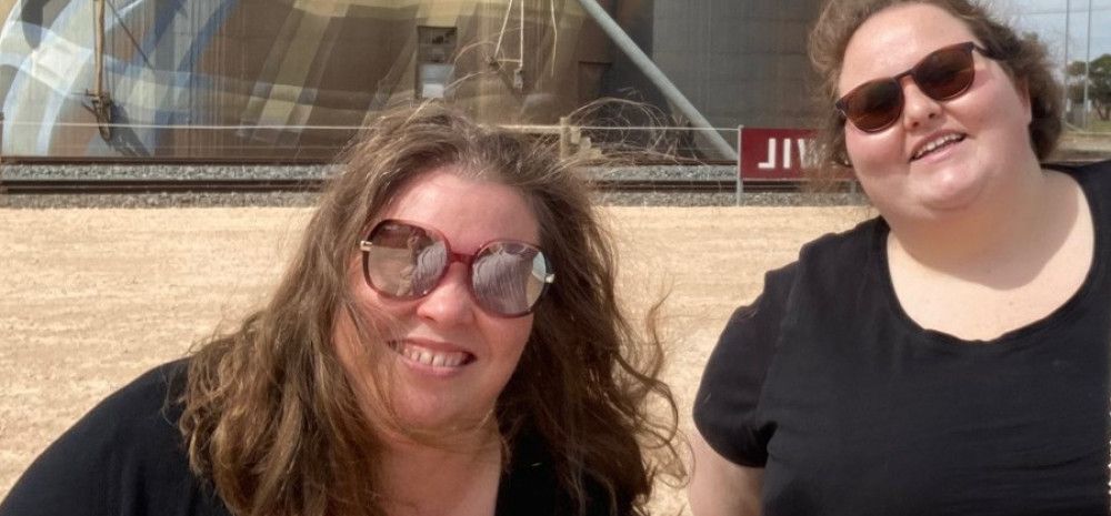 Two women smiling