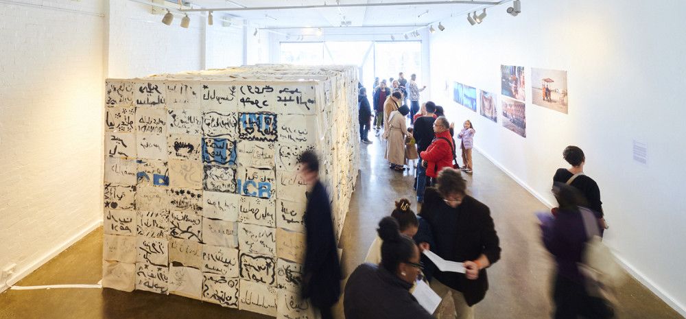 People looking at an art exhibition at the art gallery