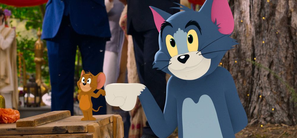 Tom & Jerry fist bumping each other
