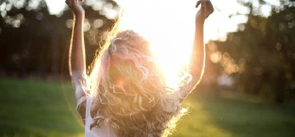 Lady with arms in the air