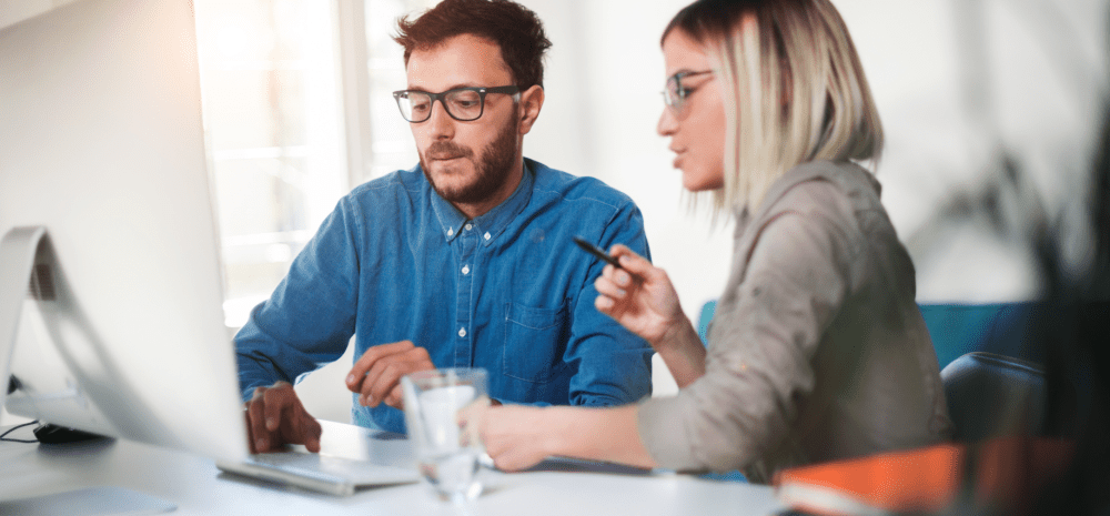 male business owner holding ipad