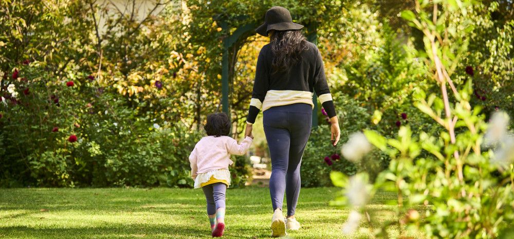 Mother and child walking around Heritage hill