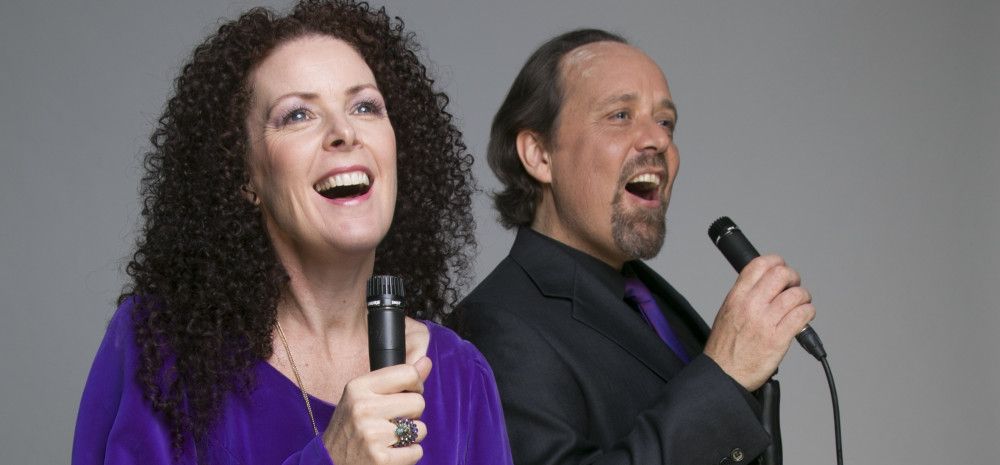 A lady and a man singing