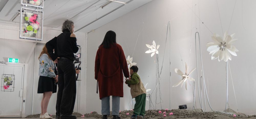 People looking at the exhibition at Walker Street Gallery 