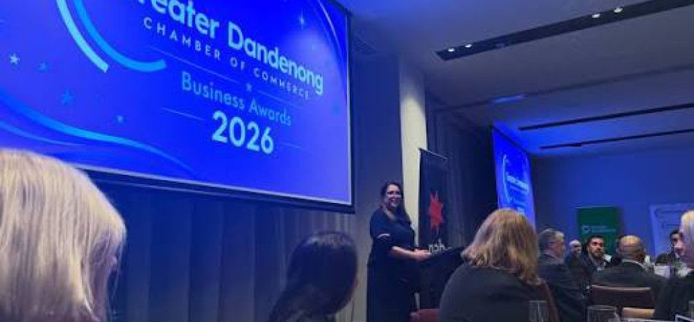 Someone speaking at the Business Awards