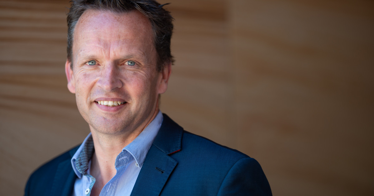 Todd Hartley, managing director of Hilton Manufacturing, in a navy jacket and open-collared shirt, photographed for the City of Greater Dandenong's 2019 Corporate Citizen of the Year award