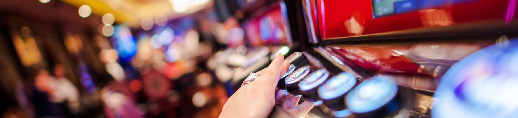 person playing gambling machine