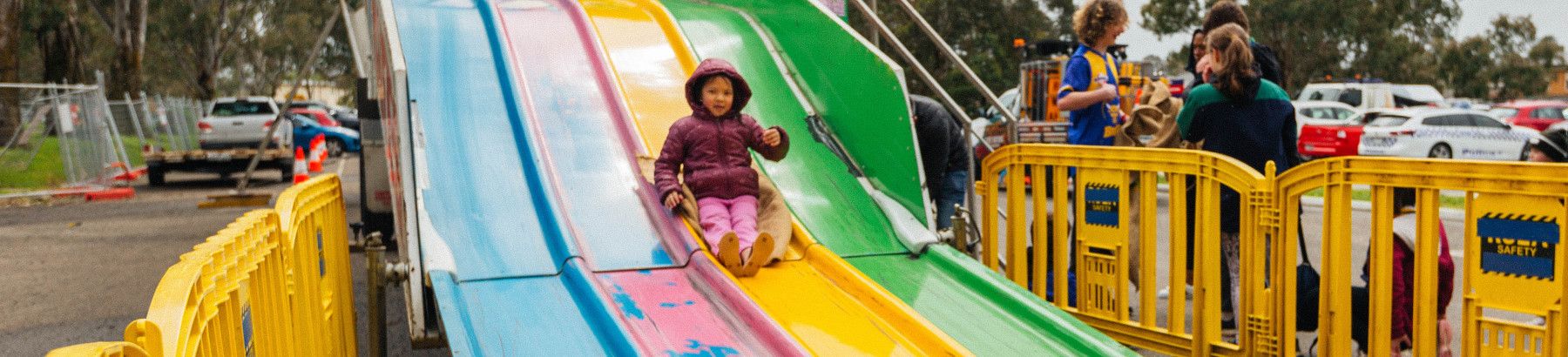 Children having fun on the slide