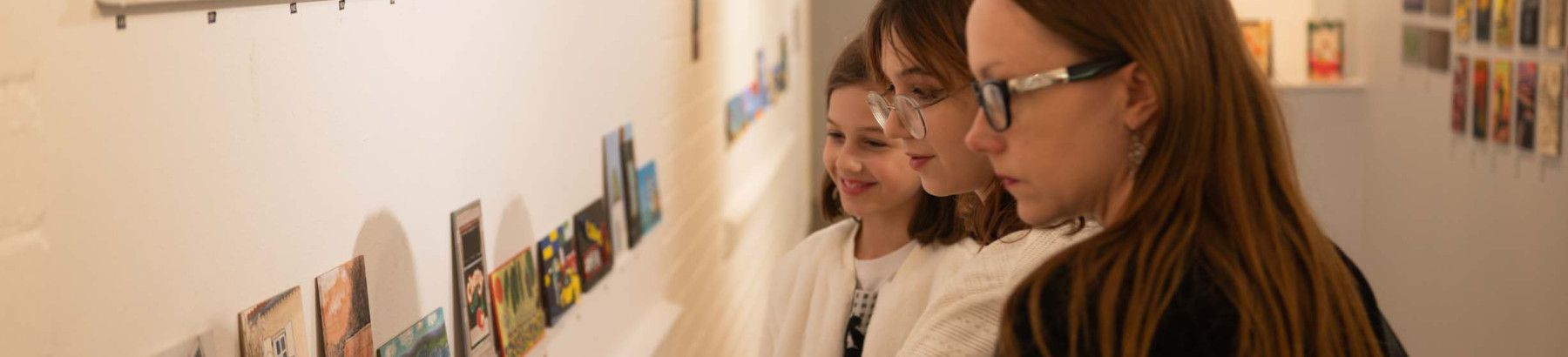 People looking at an exhibition