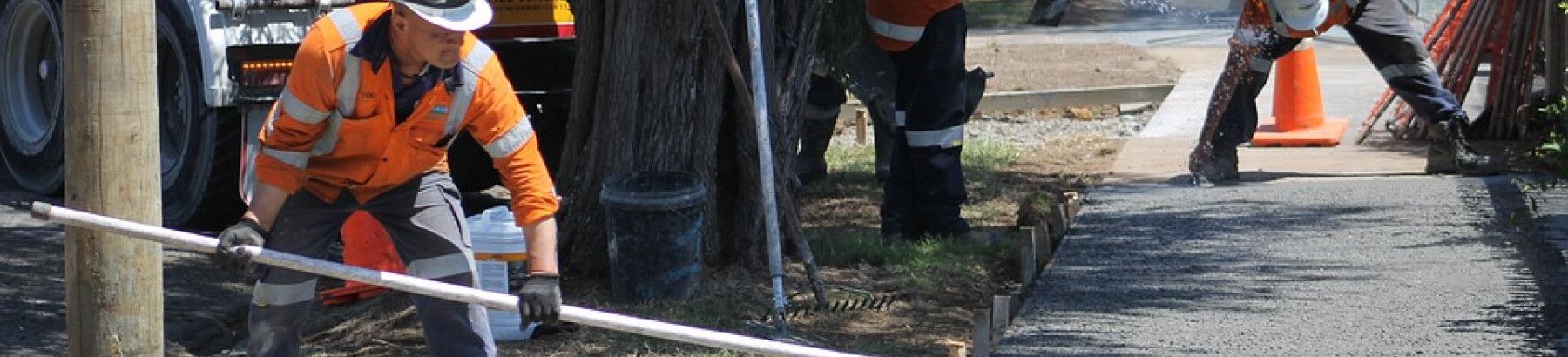 Workers constructing a footpath