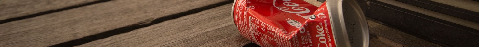 coke can dropped on walk way