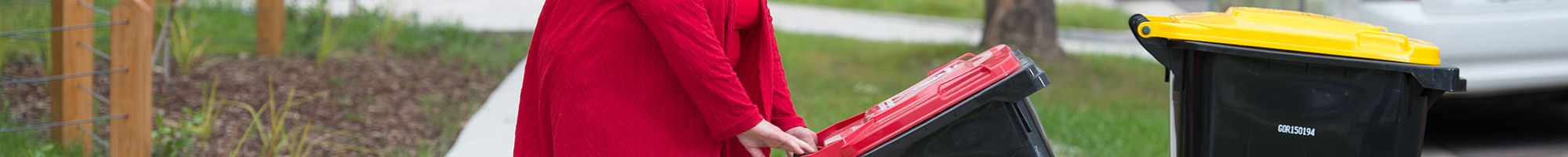 resident putting bin out