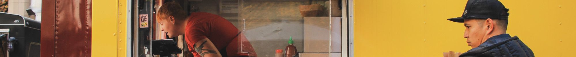 People standing at a Food Van street trading