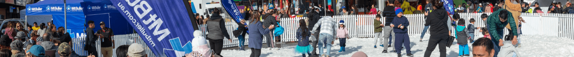 Crowds enjoying playing in the snow at Snow Fest 2019. 