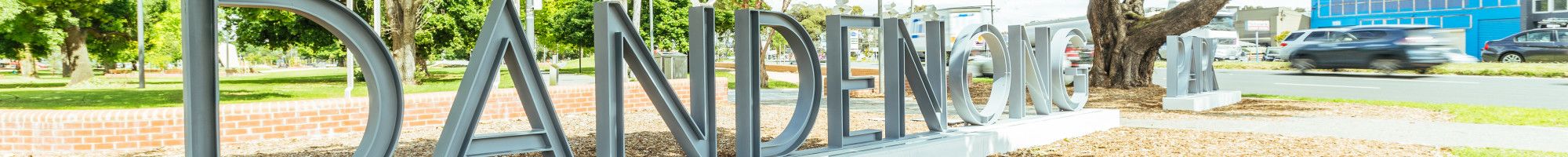 Dandenong Park sign in a park