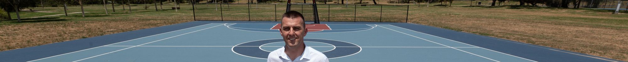 Councillor Bob Milkovic at the Tirhatuan Park basketball court