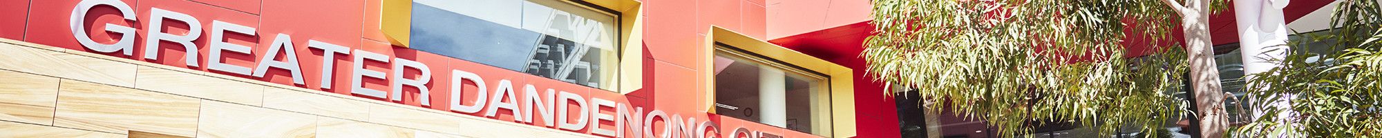 Red building with the sign Greater Dandenong City Council on the front