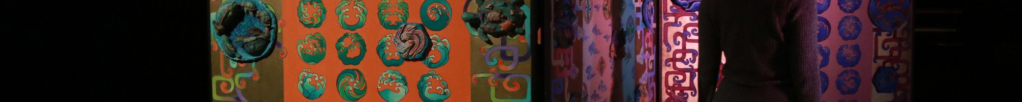 Person walking through The Maze.