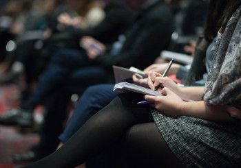 people sitting in a meeting