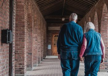 Older couple walking together